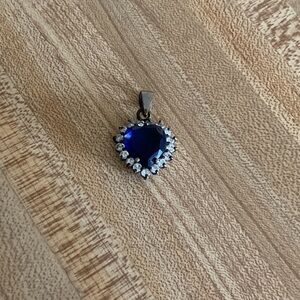 Beautiful Sterling, rhinestone and blue gem heart pendant.